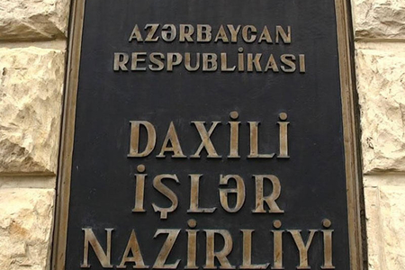 Yataqxanada sakinləri yanğından xilas edən polis zəhərlənib