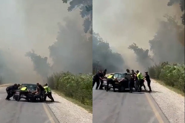 Yol polisləri maşını yanmaqdan son anda xilas etdi - VİDEO