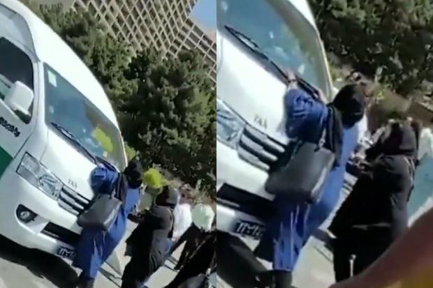 İranda övladını xilas etməyə çalışan ana polisə fəryad etdi - VİDEO