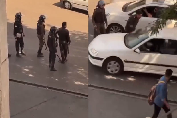 Tehranda polislər yoldan keçən maşınları dəmir dəyənəklərlə əzirlər - VİDEO