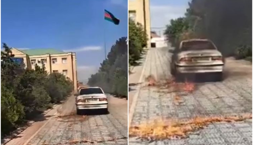 Qazi icra hakimiyyətinin qarşısında maşınını yandırdı - VİDEO